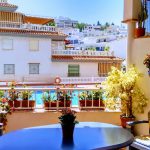 Large and lovely Apartment with internal patio, a terrace and pool for sale in La Herradura